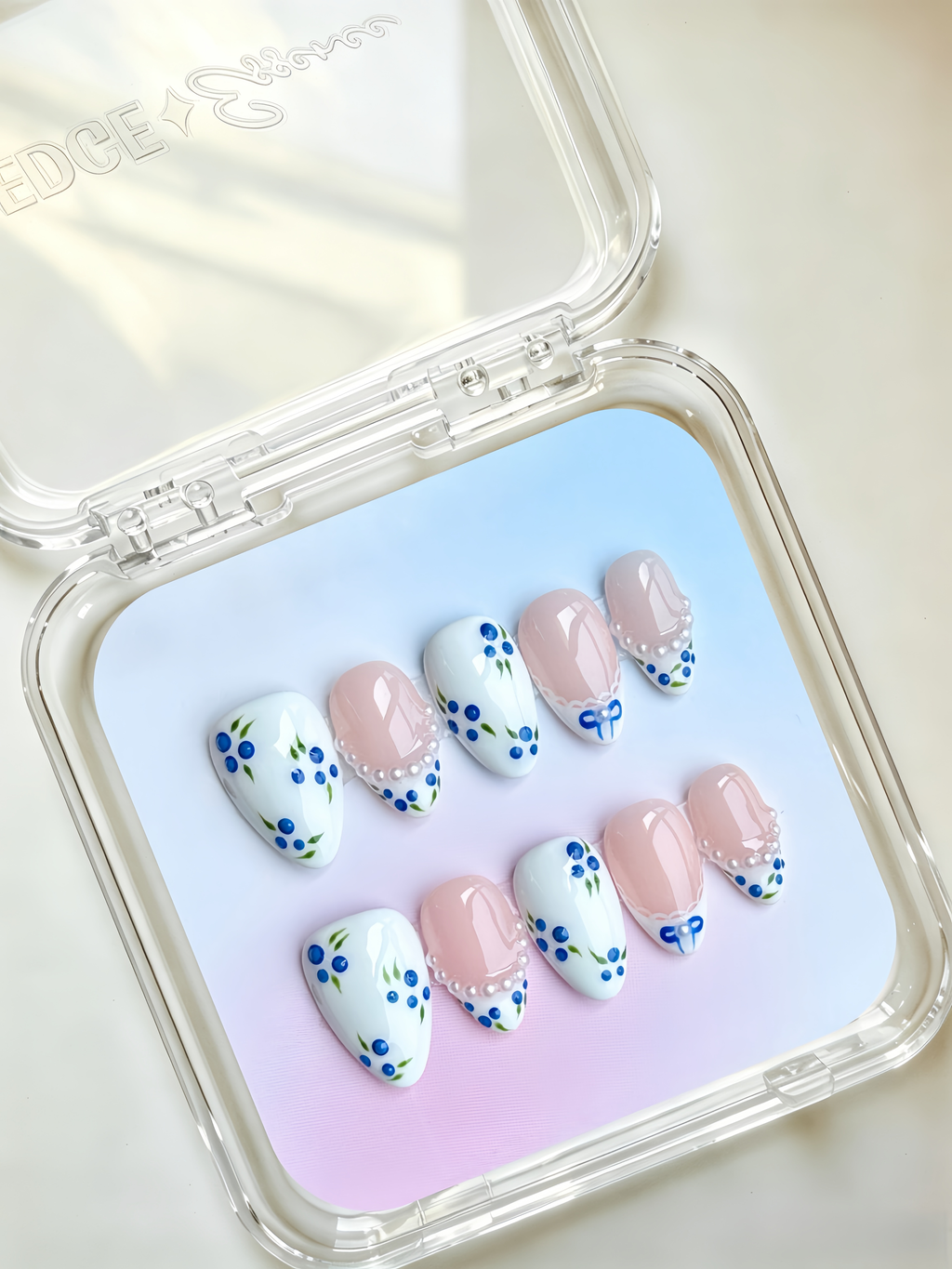 Blueberry pearl floral almond press-on nails with delicate nail art